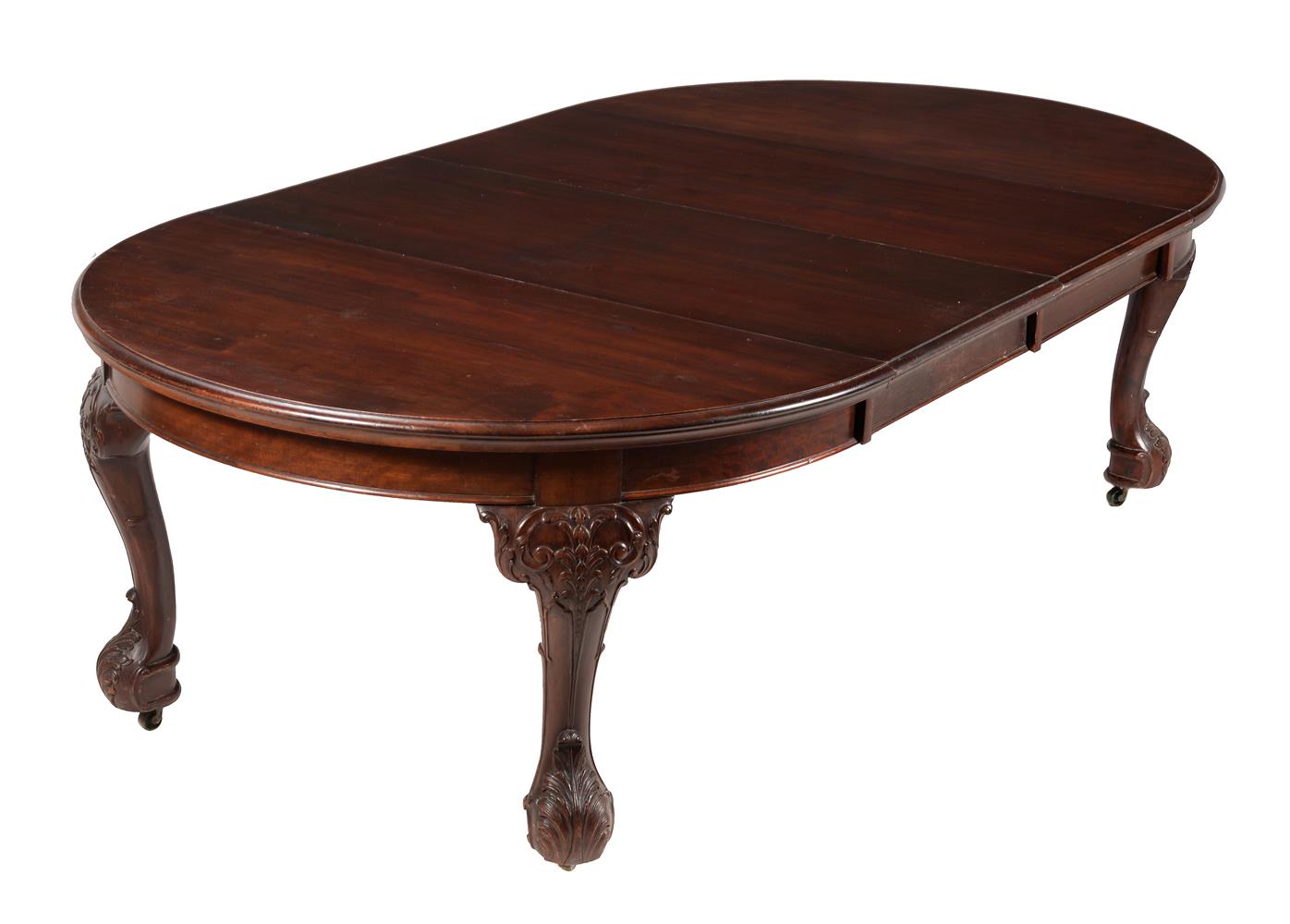 A late Victorian mahogany dining table