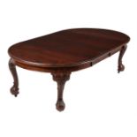 A late Victorian mahogany dining table