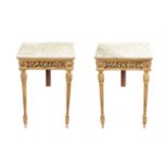 A pair of giltwood and marble topped console tables