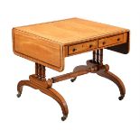 A Regency satinwood and inlaid sofa table