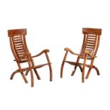 A pair of hardwood folding steamer chairs