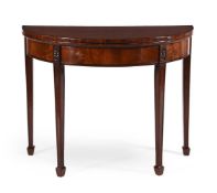A George III mahogany and crossbanded folding demi-lune card table