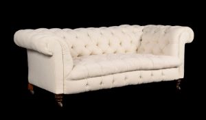 A Victorian walnut and cream linen upholstered sofa