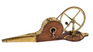 An oak and brass mounted mechanical bellows