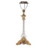 A gilt brass and moulded glass table lamp