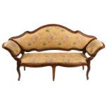 A Continental walnut and upholstered sofa