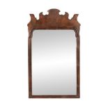 A George II walnut fret-framed wall mirror