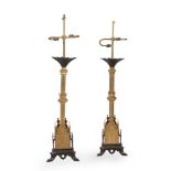 A pair of gilt and patinated metal table lamps in Regency Gothic revival taste