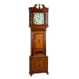 An oak and mahogany longcase clock