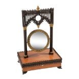 A satinwood, bronze and gilt bronze mounted table mirror in the Gothic manner