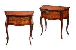 A pair of French walnut and parquetry side tables