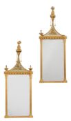A pair of giltwood wall mirrors in Regency style