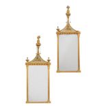 A pair of giltwood wall mirrors in Regency style