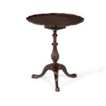 A mahogany tilt top occasional table