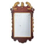 A MAHOGANY AND GILTWOOD FRET FRAME MIRROR, MID-18TH CENTURY STYLE