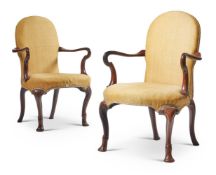 A PAIR OF GEORGE I WALNUT AND YELLOW SILK UPHOLSTERED ARMCHAIRS, CIRCA 1720