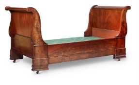 A FRENCH WALNUT BATEAU-EN-LIT, CIRCA 1840