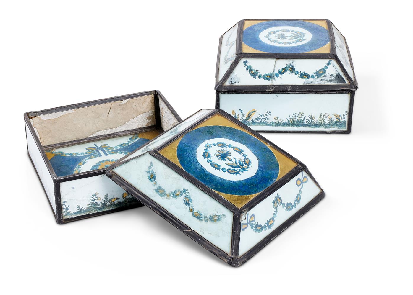 A PAIR OF REVERSE PAINTED GLASS AND LEAD LINED BOXES AND DOMED COVERS