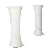 TWO SIMILAR BLANC-DE-CHINE TAPERING CYLINDRICAL BEAKER VASES CIRCA 1700 OR LATERApplied with flowe