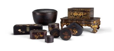 A GROUP OF JAPANNED AND BLACK LACQUER BOXES AND A STAND, VARIOUS DATES