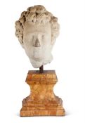 A FLORENTINE CARVED STONE CLASSICAL HEAD