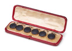 A SET OF SIX VICTORIAN ONYX AND GOLD BUTTONS