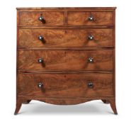 A FLAME MAHOGANY BOW FRONTED CHEST, GEORGE III