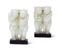 A PAIR OF CHINESE JADE GROUPS OF BOYS, QING DYNASTY, 18TH/19TH CENTURY