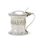 AN ARTS AND CRAFTS HAMMERED SILVER CIRCULAR MUSTARD POT BY OMAR RAMSDEN & ALWYN CARR