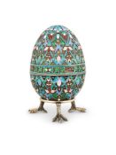 A RUSSIAN SILVER AND CLOISONNÉ ENAMEL EGG BY KHLEBNIKOV