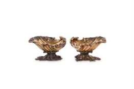 A PAIR OF SILVER GILT SHELL SALT CELLARS BY C. J. VANDER LTDLONDON 1965The scroll lifts centred by