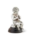 A VICTORIAN SILVER MODEL OF A PUTTO BY S. SMITH & SON