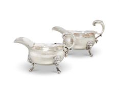 A PAIR OF EARLY GEORGE III SILVER OVAL SAUCE BOATS