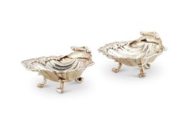 A PAIR OF GEORGE II SILVER SHELL SHAPED SALT CELLARS