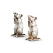 A PAIR OF SILVER NOVELTY SALT AND PEPPER CASTERS BY RICHARD COMYNS