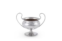 AN ARTS AND CRAFTS HAMMERED SILVER TWIN HANDLED CUP BY OMAR RAMSDEN & ALWYN CARR