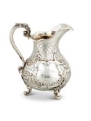 [CHARLES DICKENS INTEREST] A VICTORIAN SILVER BALUSTER CREAM JUG BY JOHN SAMUEL HUNT