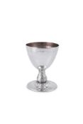 AN ARTS AND CRAFTS HAMMERED SILVER GOBLET BY OMAR RAMSDEN & ALWYN CARR
