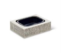 A SILVER RECTANGULAR DESK TIDY OR VIDE POCHE BY GERALD BENNEY