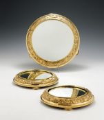 A VICTORIAN SCOTTISH SILVER GILT SUITE OF THREE MIRROR PLATEAUX BY GEORGE EDWARD & SONS