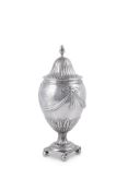 A GEORGE III SILVER OVOID PEDESTAL SUGAR VASE AND COVER BY CHRISTOPHER MAKEMEID
