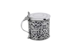 A GEORGE III SILVER PIERCED DRUM MUSTARD POT BY WILLIAM PLUMMER