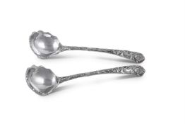 A PAIR OF SILVER VINE AND HOPS PATTERN SAUCE LADLES BY C.J. VANDER LTD