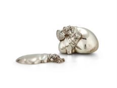 A ZIMBABWEAN SILVER COLOURED SMALL MODEL OF A HIPPOPOTAMUS AND CALF BY PATRICK MAVROS