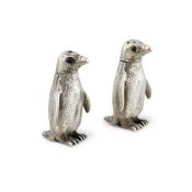 A PAIR OF SILVER NOVELTY SALT AND PEPPER CASTERS BY RICHARD COMYNS