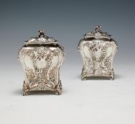 A PAIR OF EARLY GEORGE III SILVER BOMBÉ TEA CADDIES BY EMICK ROMER