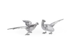 A PAIR OF CONTINENTAL SILVER COLOURED PHEASANT TABLE ORNAMENTS