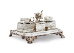 A LATE GEORGE III SILVER SHAPED RECTANGULAR INKSTAND BY REBECCA EMES AND EDWARD BARNARD I