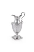 A GEORGE III SILVER VASE SHAPE CREAM JUG BY ROBERT HENNELL I