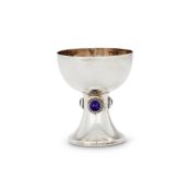 A SILVER PLAIN GOBLET APPLIED WITH AMETHYST CABOCHONS BY HARRODS STORES LTD (SIR RICHARD BURBRIDGE)